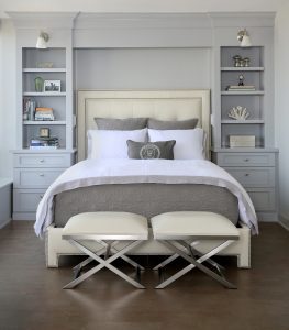 Queen size bed with bookcases on either side