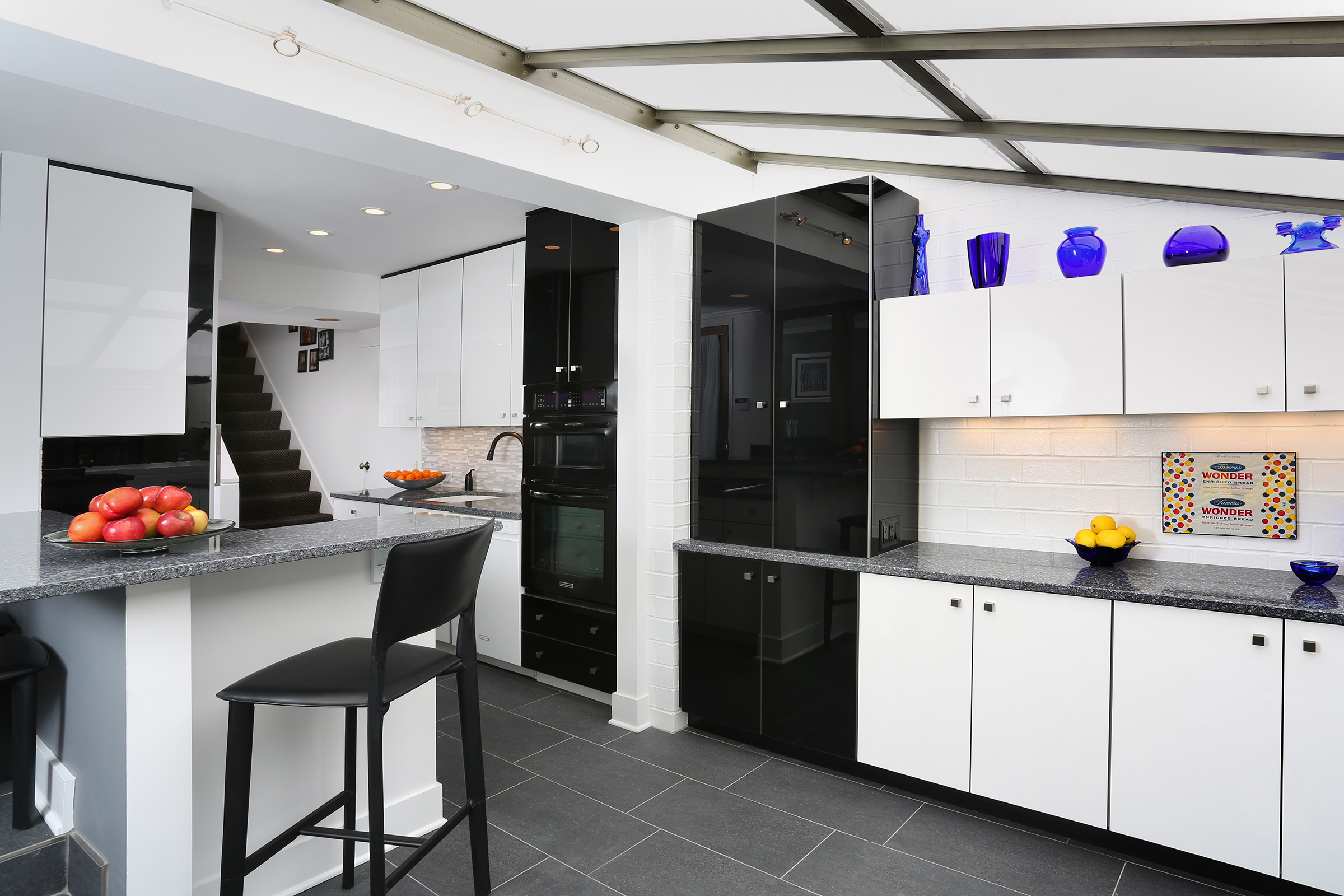 Modern high gloss high contrast galley kitchen