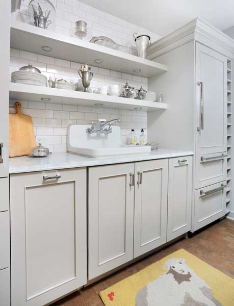 Small galley style gray kitchen in a Chicago condo