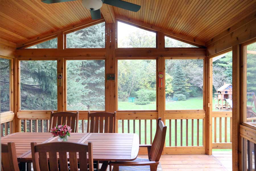 Screen porch addition to a split level home