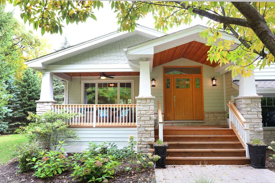 Craftsman style split level house with porch