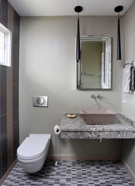 floating vanity and wall hung toilet for ada accessible bathroom