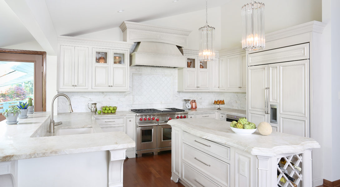 White kitchen with warm gray undertones and a sloping ceiling