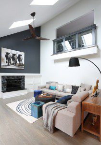 modern style living room with juliet balcony to the loft above