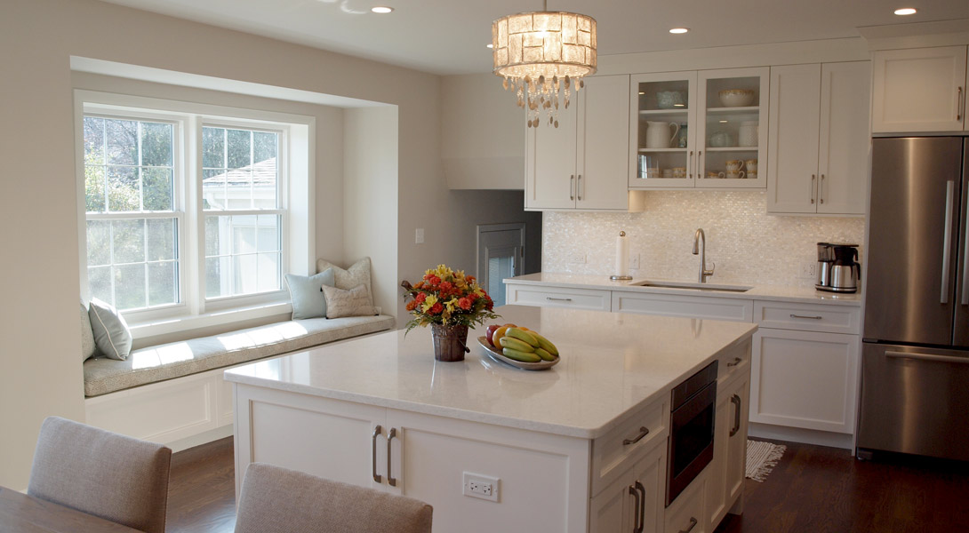 Window seat in the kitchen adjacent to the island