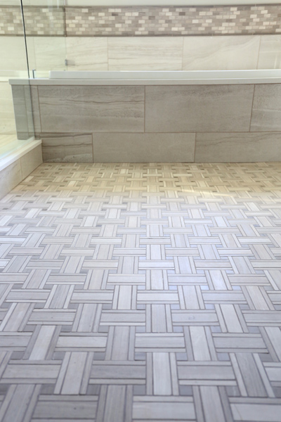 basket weave floor tile pattern in master bathroom