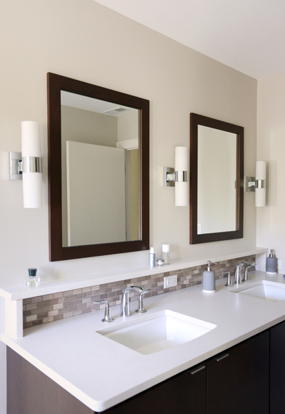 Master bathroom vanity with matching his and hers sinks and storage ledge