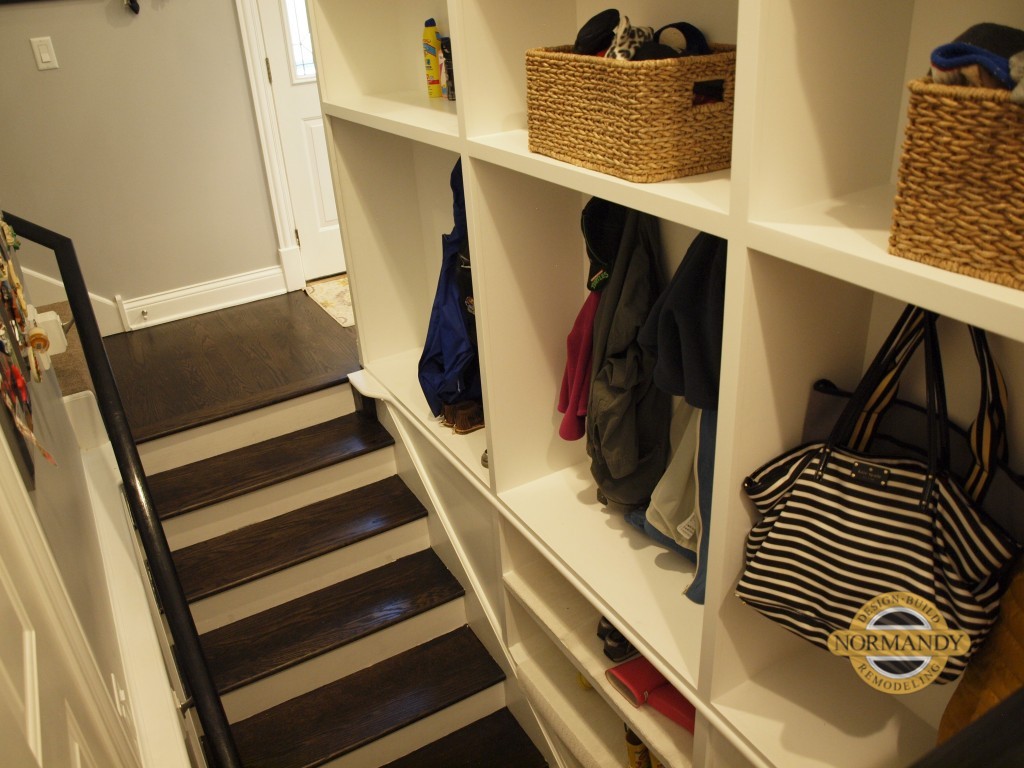 mudroom cubbies incorporated into basement stairwell