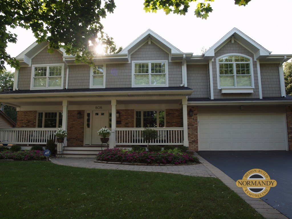 Traditional style home exterior with angled roof lines and front porch