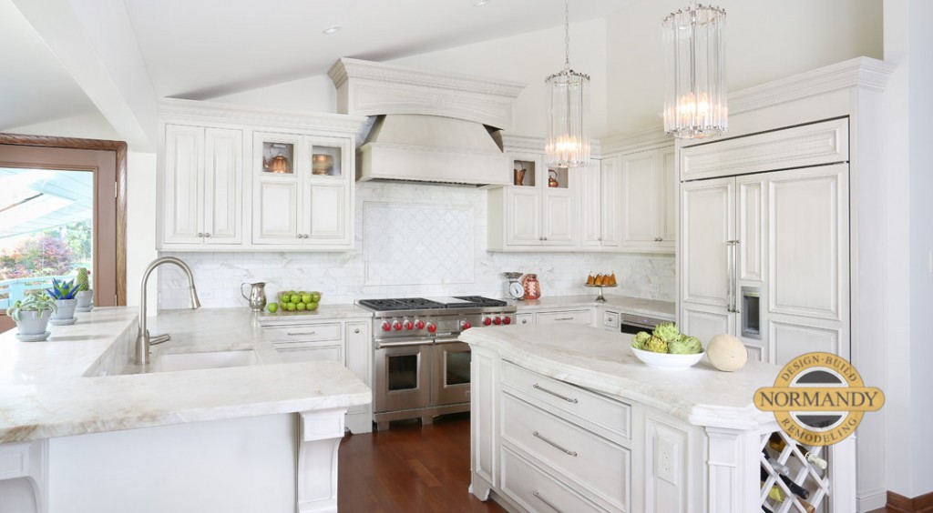 White kitchen with warm gray undertones and a sloping ceiling