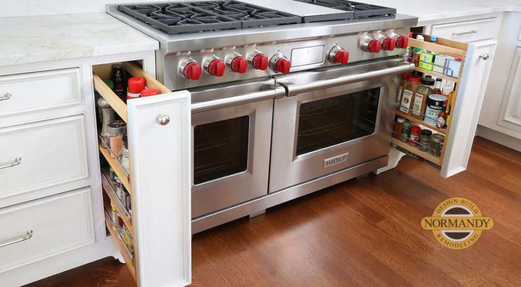 pull-out storage for spices and oils on either side of the stove