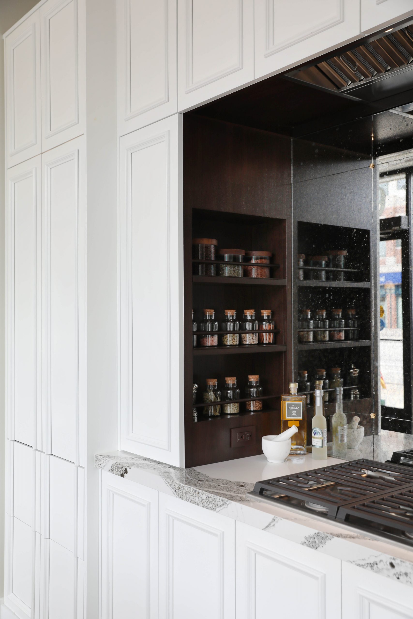 antiqued mirrored backsplash