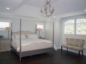 Master bedroom with tray ceiling as part of home addition