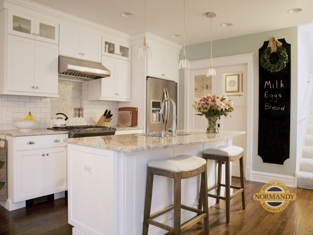 Small white kitchen with island on Chicago's North Shore