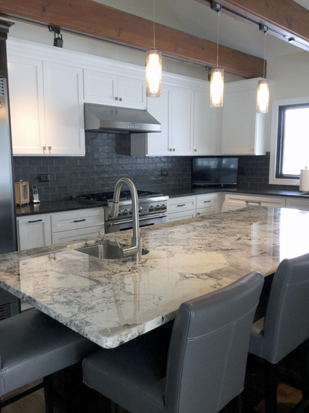 White kitchen cabinetry with shaker door style