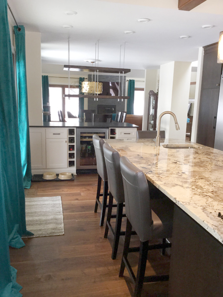 Suspended shelving and kitchen island with sink