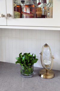 Textured back splash tile in the beverage center area