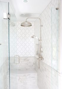 walk-in shower with mother of pearl inlay tile