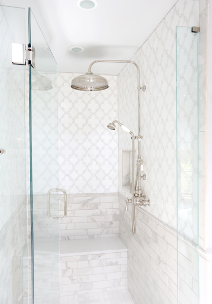 walk-in shower with mother of pearl inlay tile