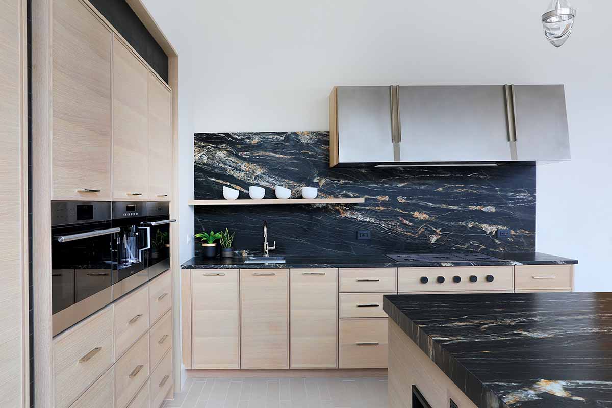 White Oak kitchen with slab backsplash