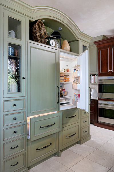 Large refrigerator built in to look like cabinetry