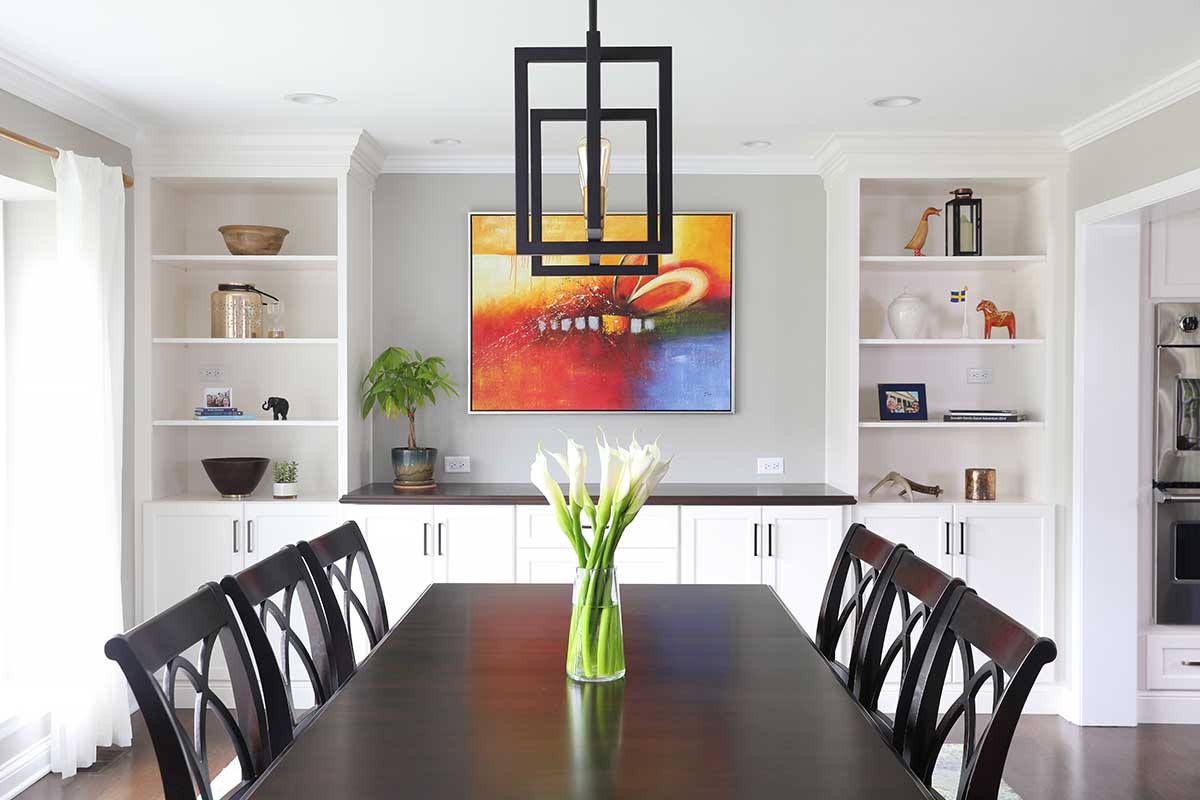 Custom white cabinetry in dining room