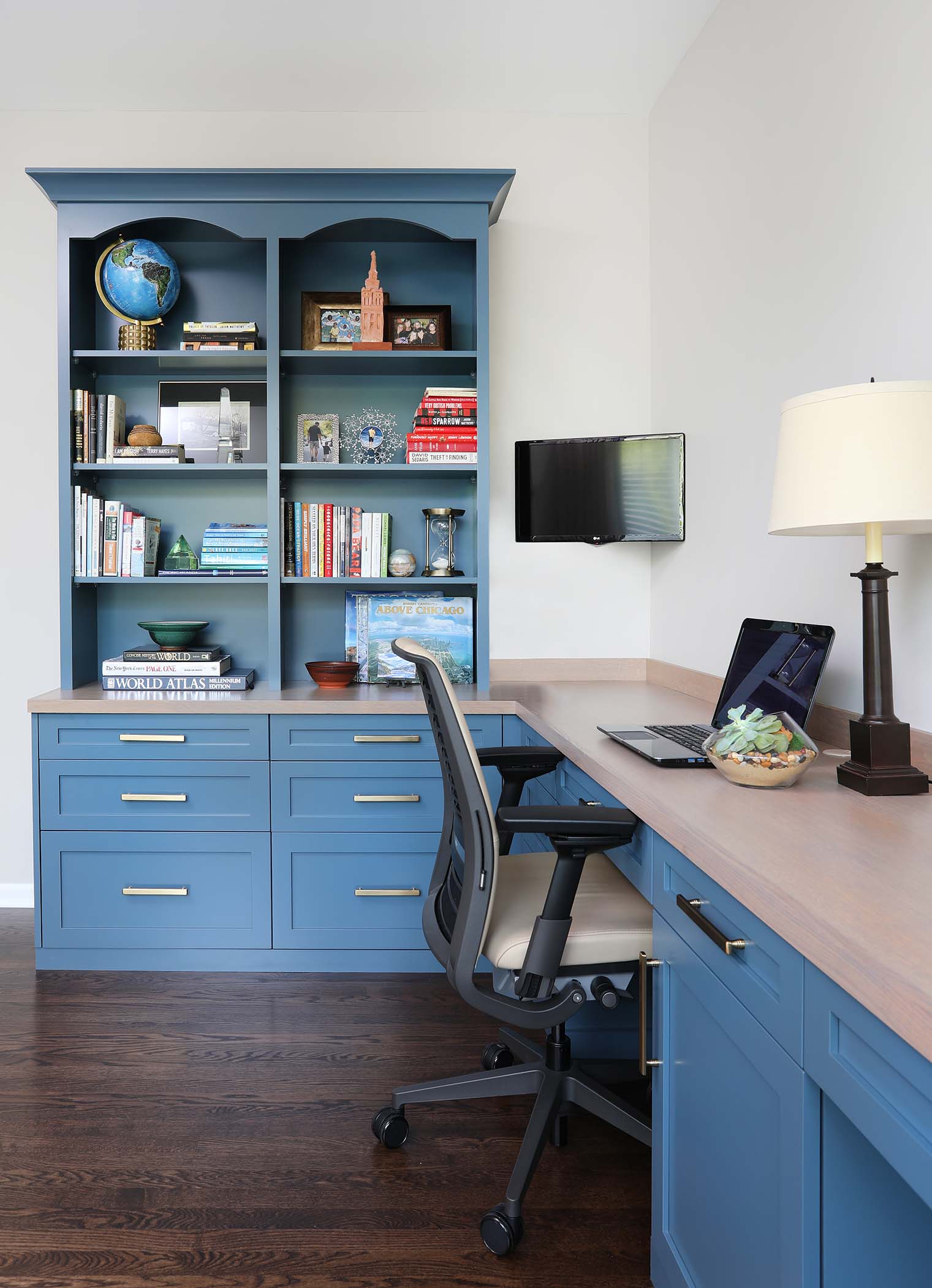 Blue cabinetry in a home office