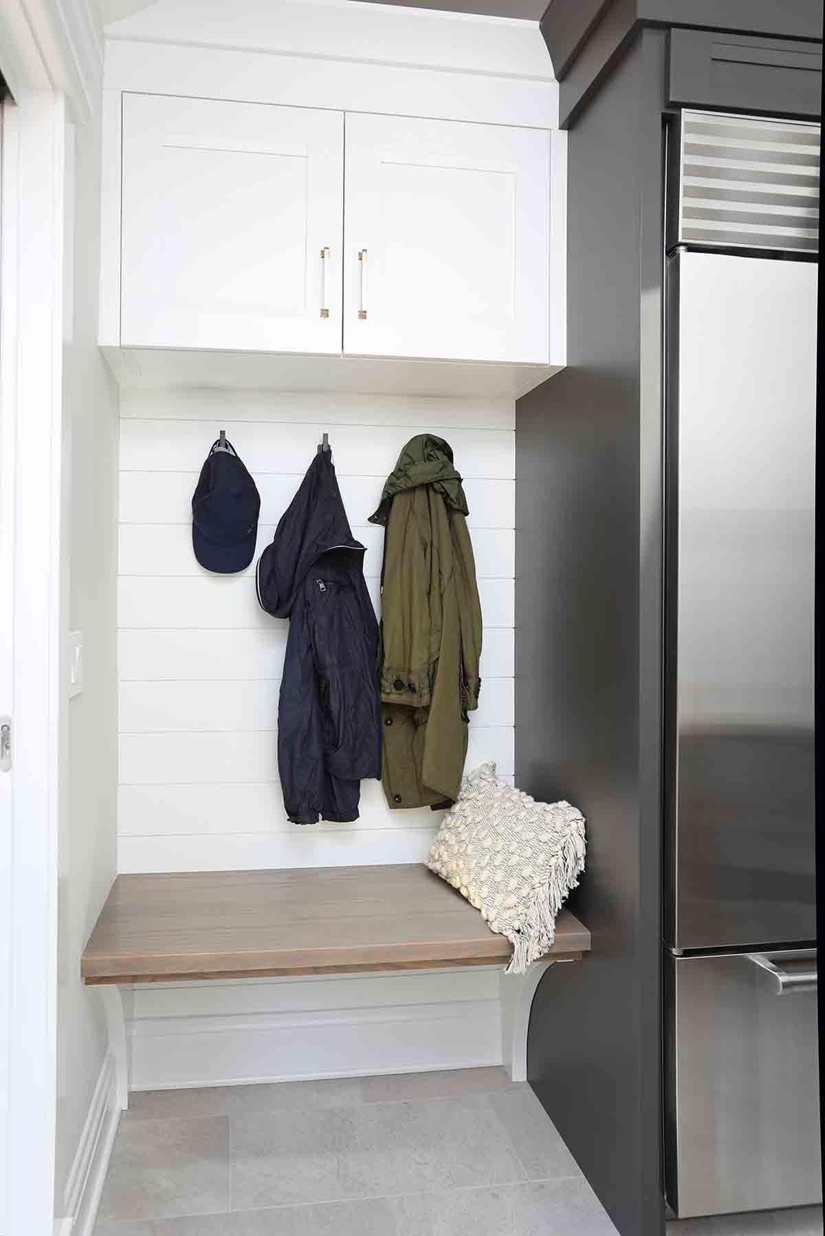 Cozy mudroom tucked in kitchen for entryway