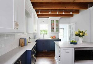 Modern Rustic kitchen, white center island, blue lower cabinets, exposed beams,