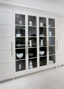 built in cabinetry for storage and viewing