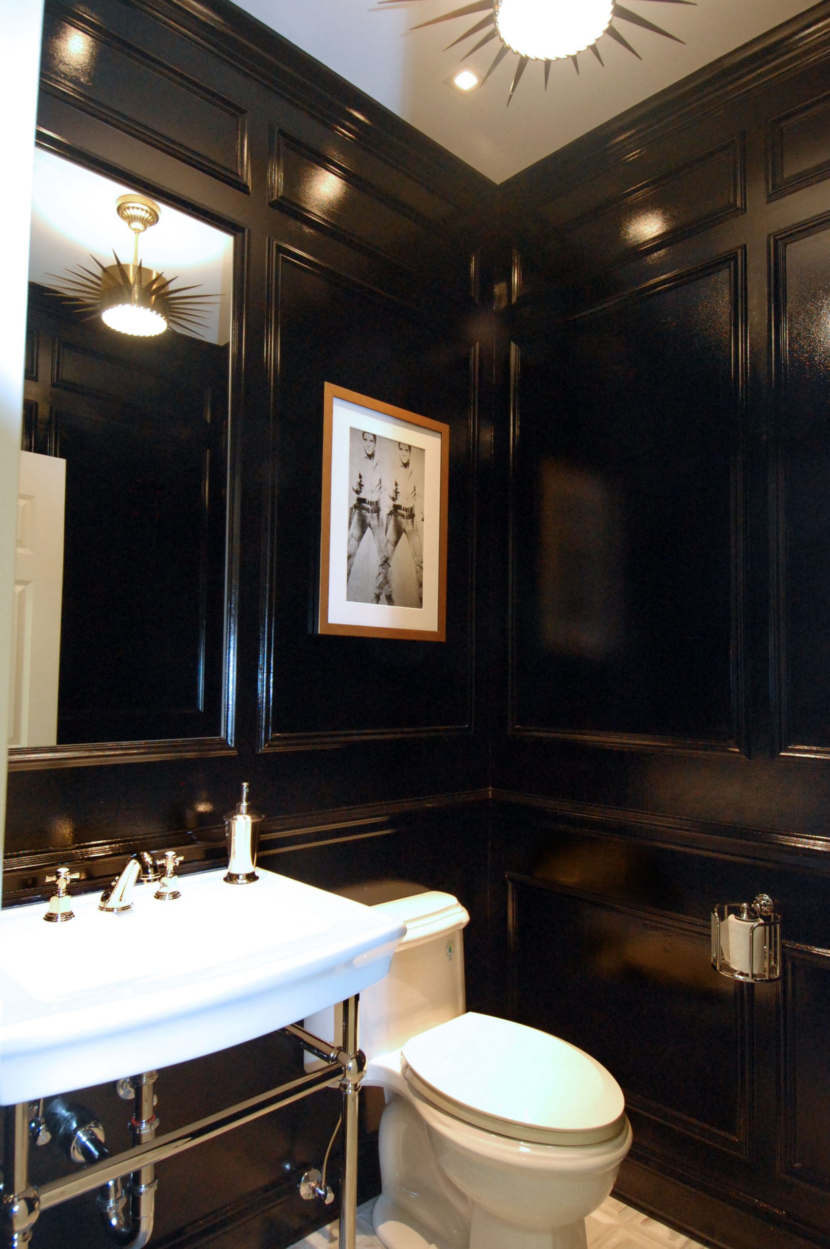 powder room with black walls