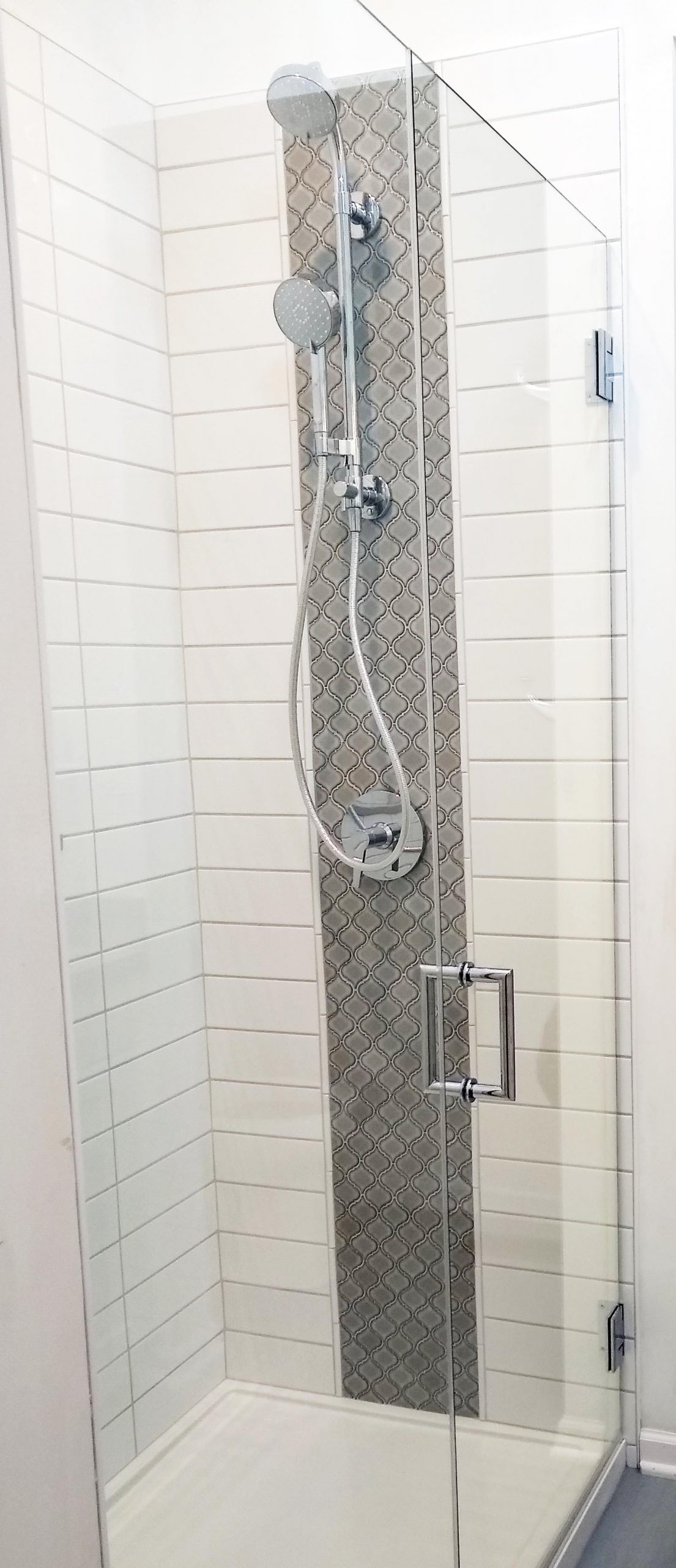 vertical band of tile in the shower