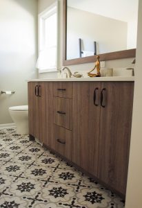 Medium wood tone bathroom vanity