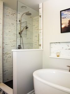 Bathroom with rustic look tile in the shower