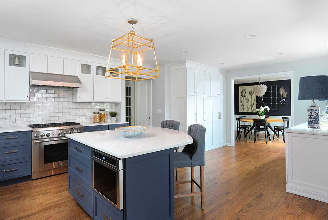 Blue kitchen with white cabinet upper cabinets