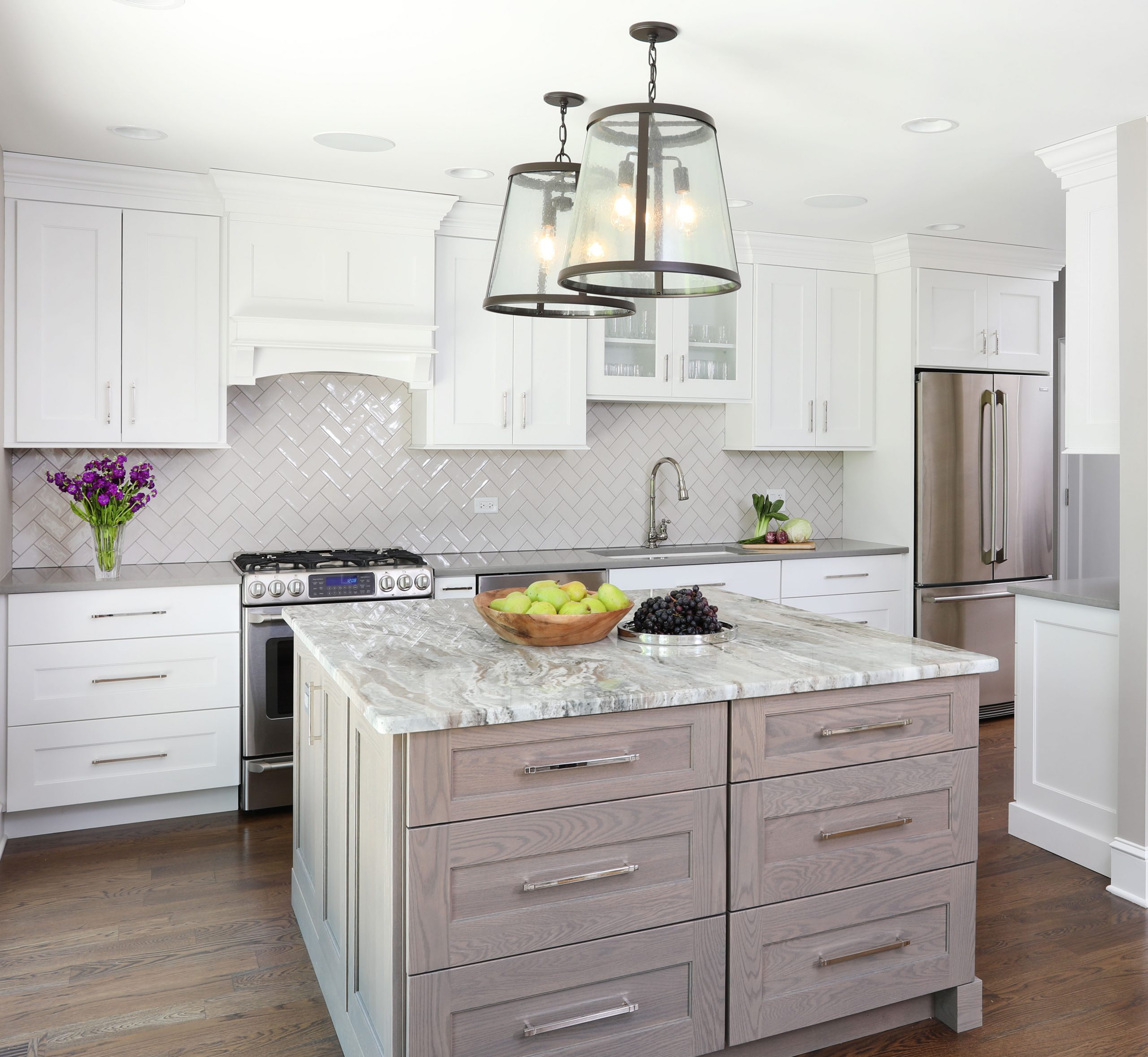 white painted kitchen cabinets with soft gray stain island