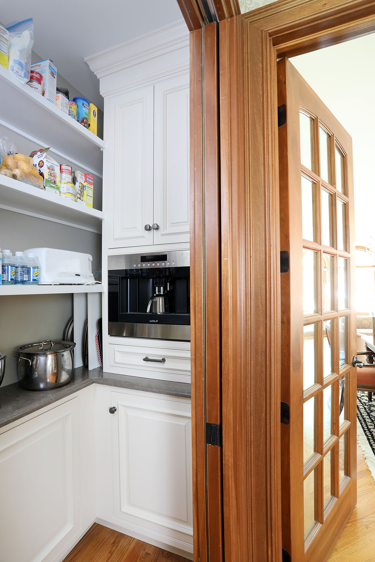 Pantry with storage and appliances