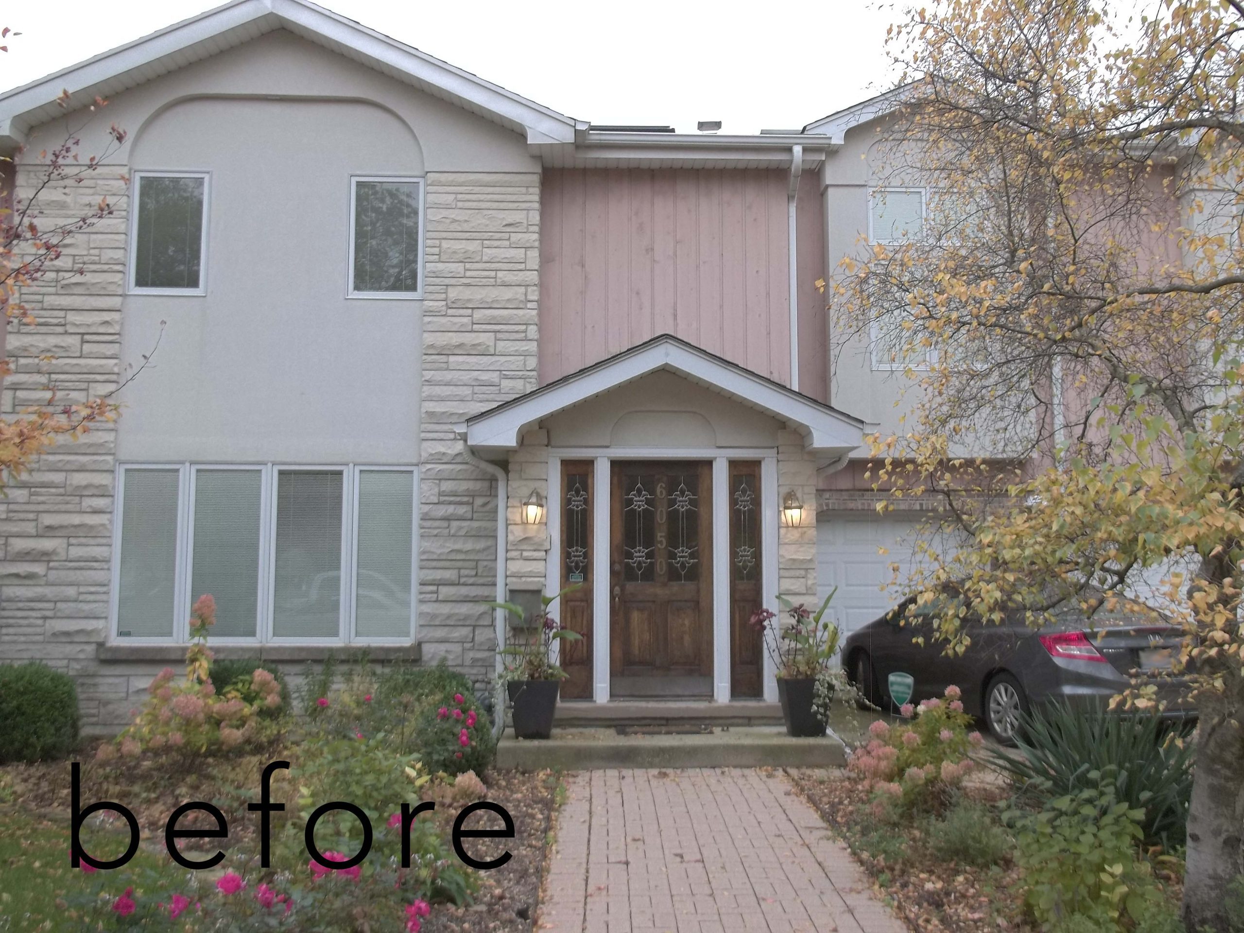 pink home exterior before remodeling