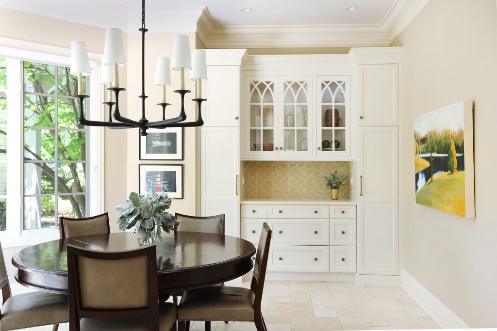 Breakfast area with built in hutch and mullion cabinet doors