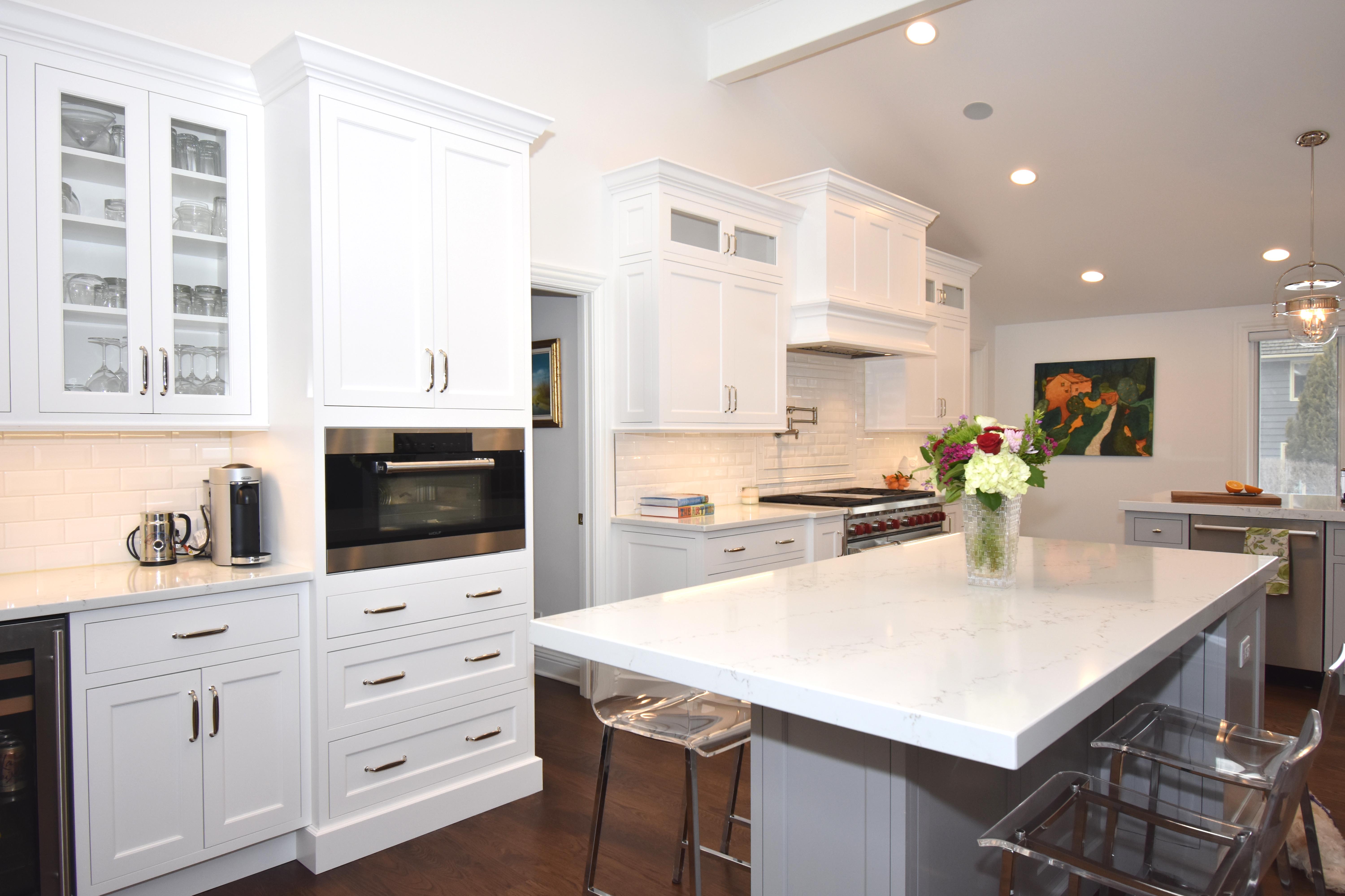 white kitchen with two islands