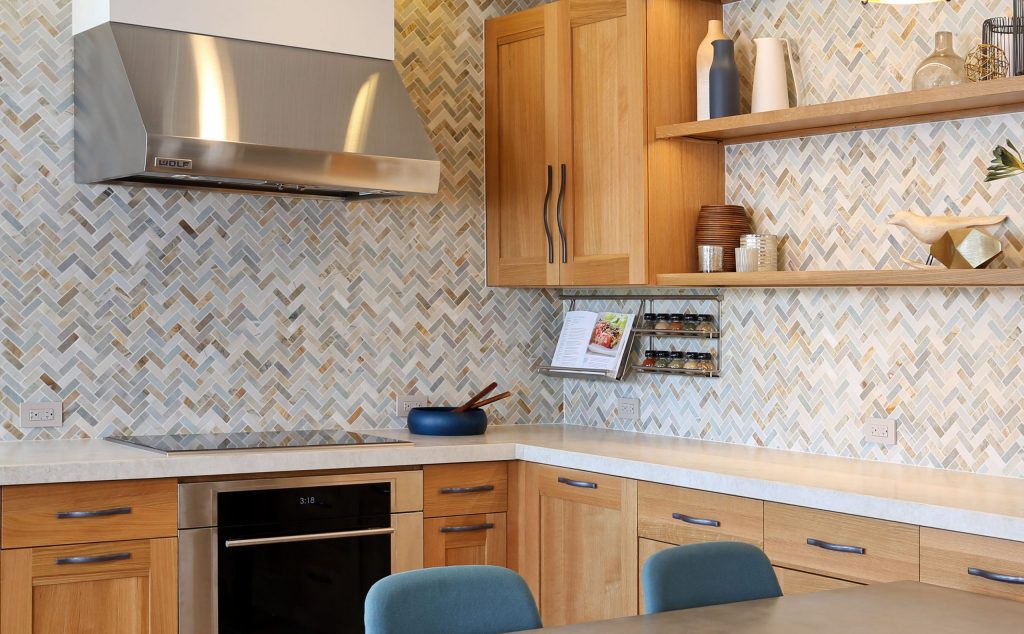 oak kitchen with herringbone tile backsplash