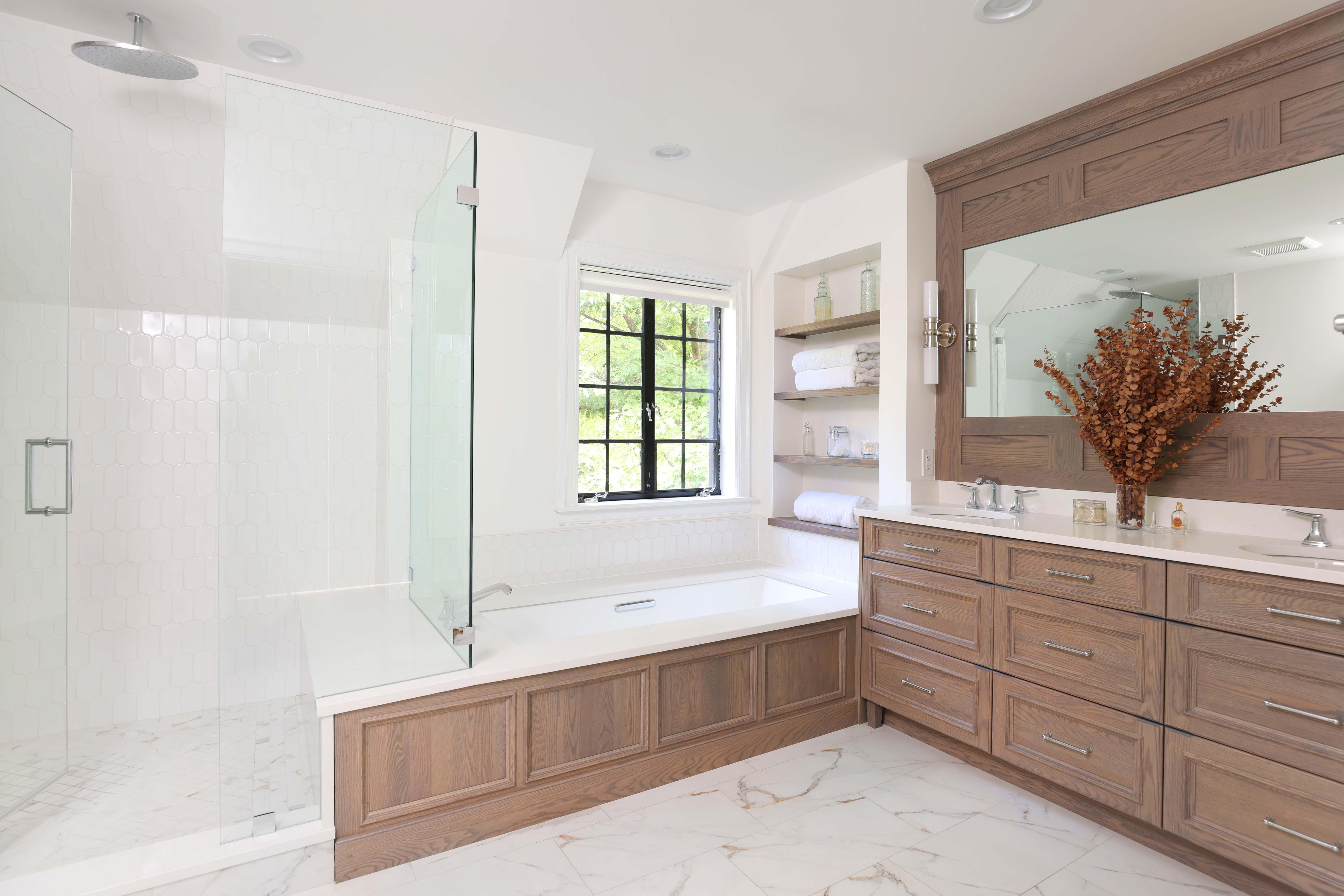 Primary bathroom with oak vanity