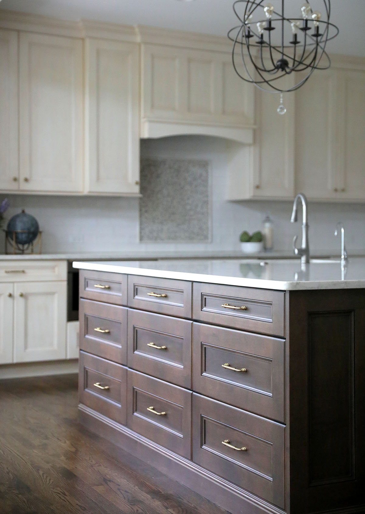 Wood Drawers with gold handles in large center island