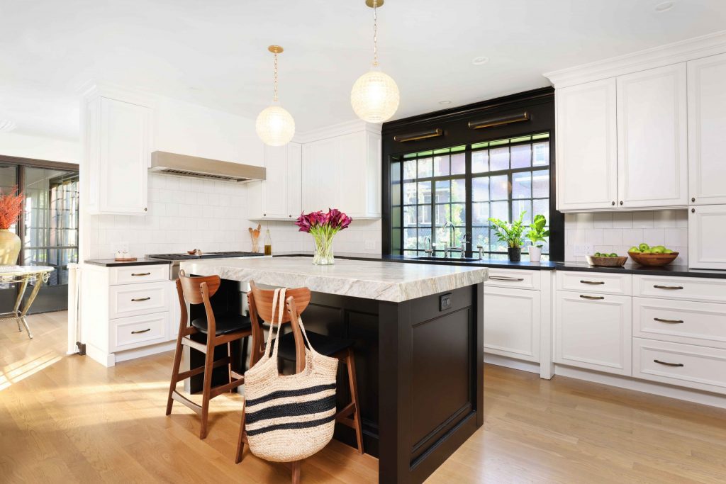 White kitchen was moved to a new location as part of a home reconfiguration