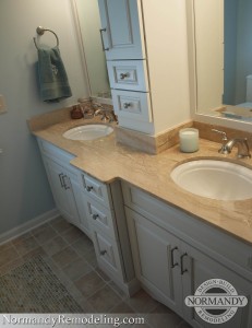 White bathroom with marble countertops