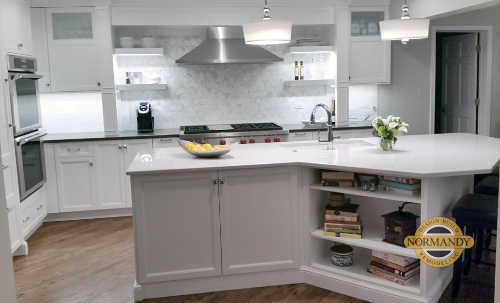 white and gray kitchen with open shelves and angled kitchen island