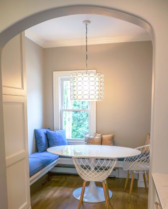 Breakfast room, built in bench seating, and arched opening