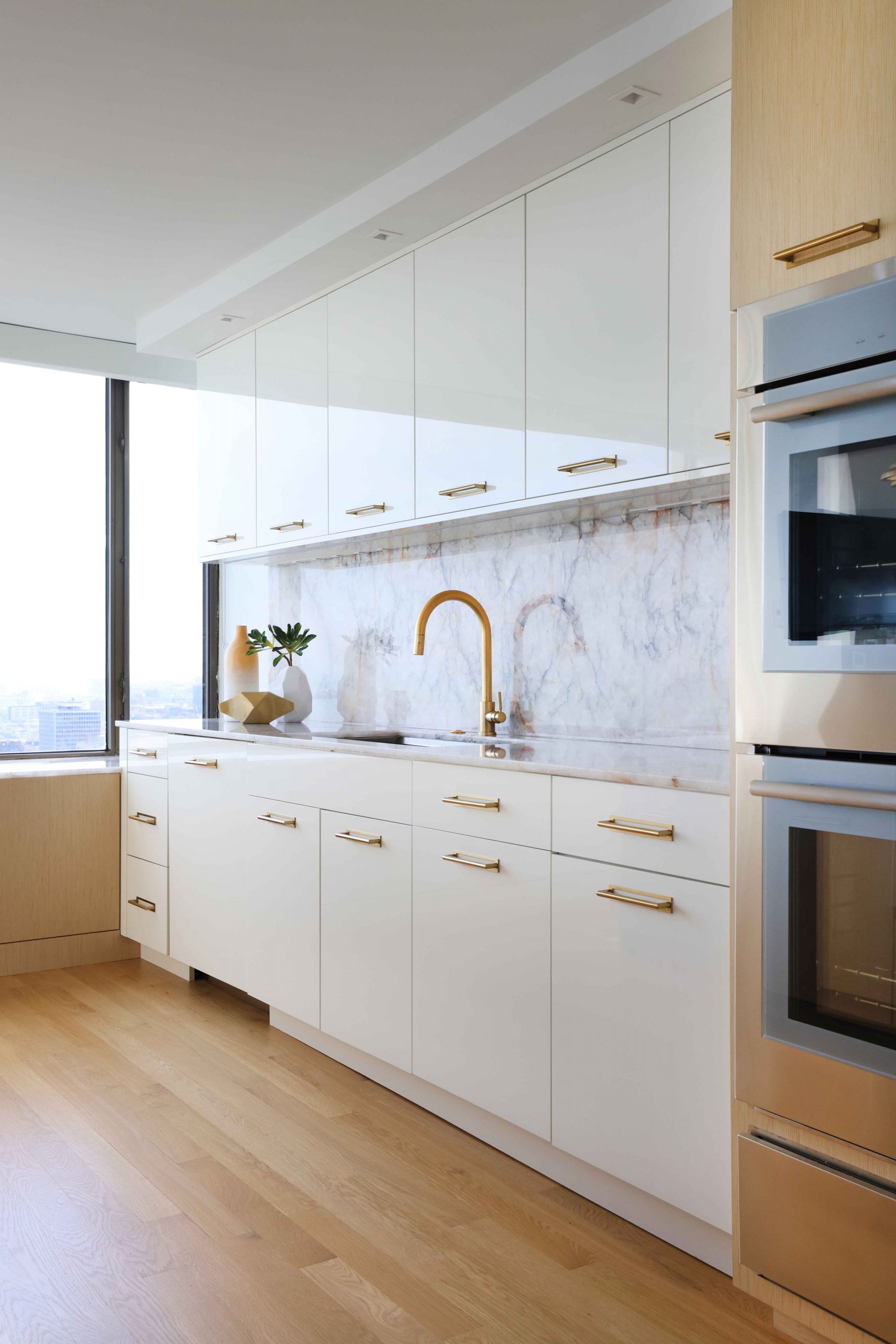 Modern Chicago condo kitchen with high gloss cabinets