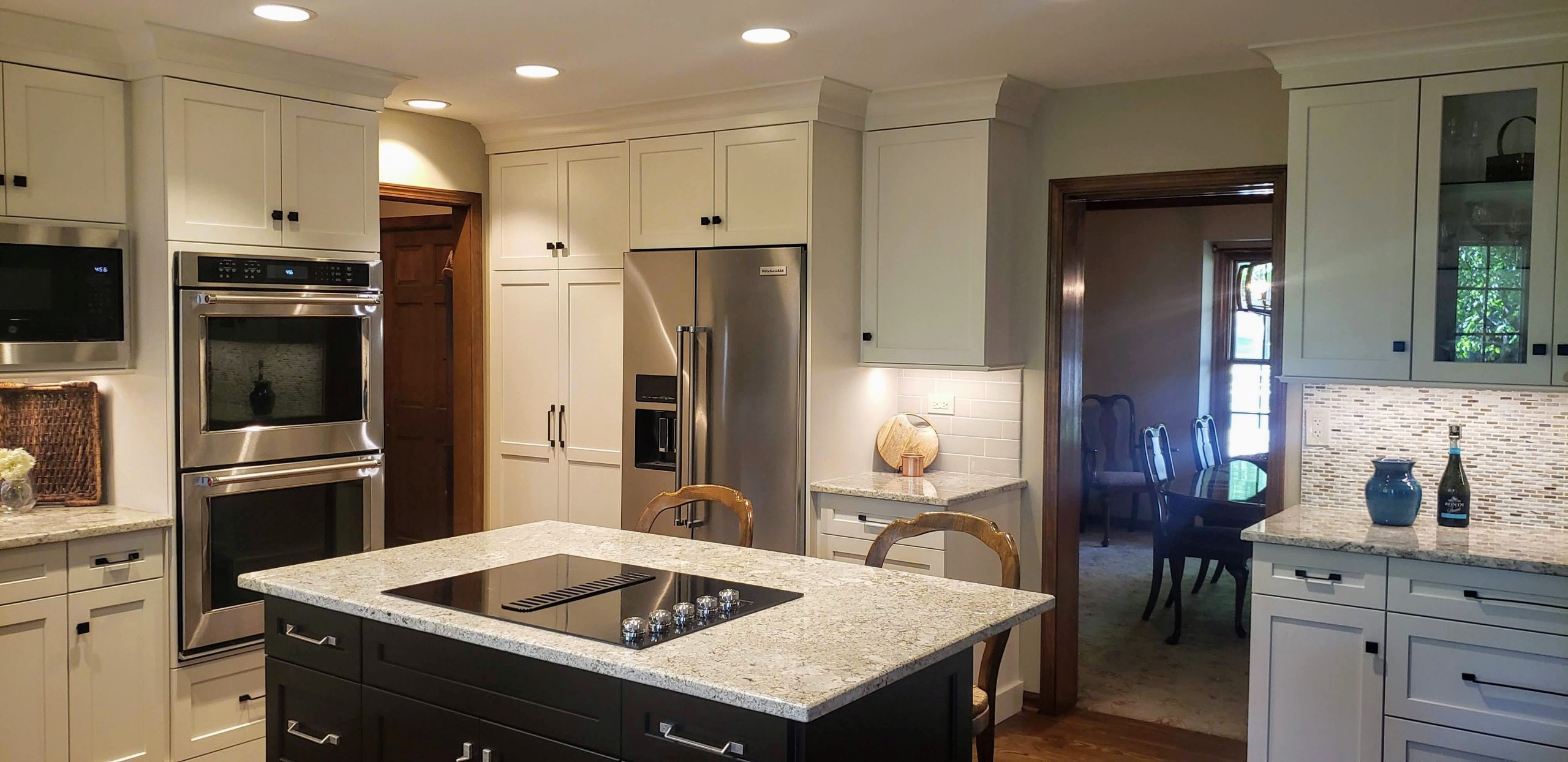 White kitchen with dark island