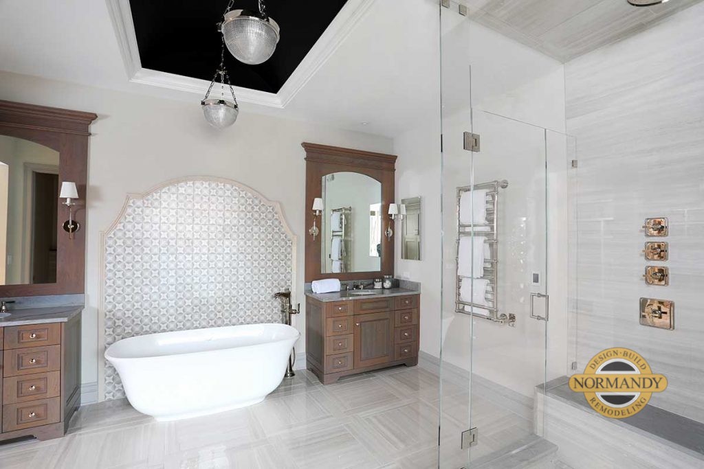 patterned tile seen behind the bathtub is one of the top 2022 bathroom trends